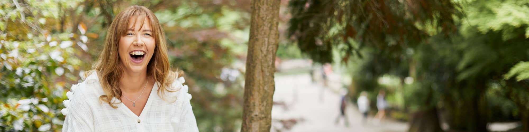Smiling in forest in South Wales